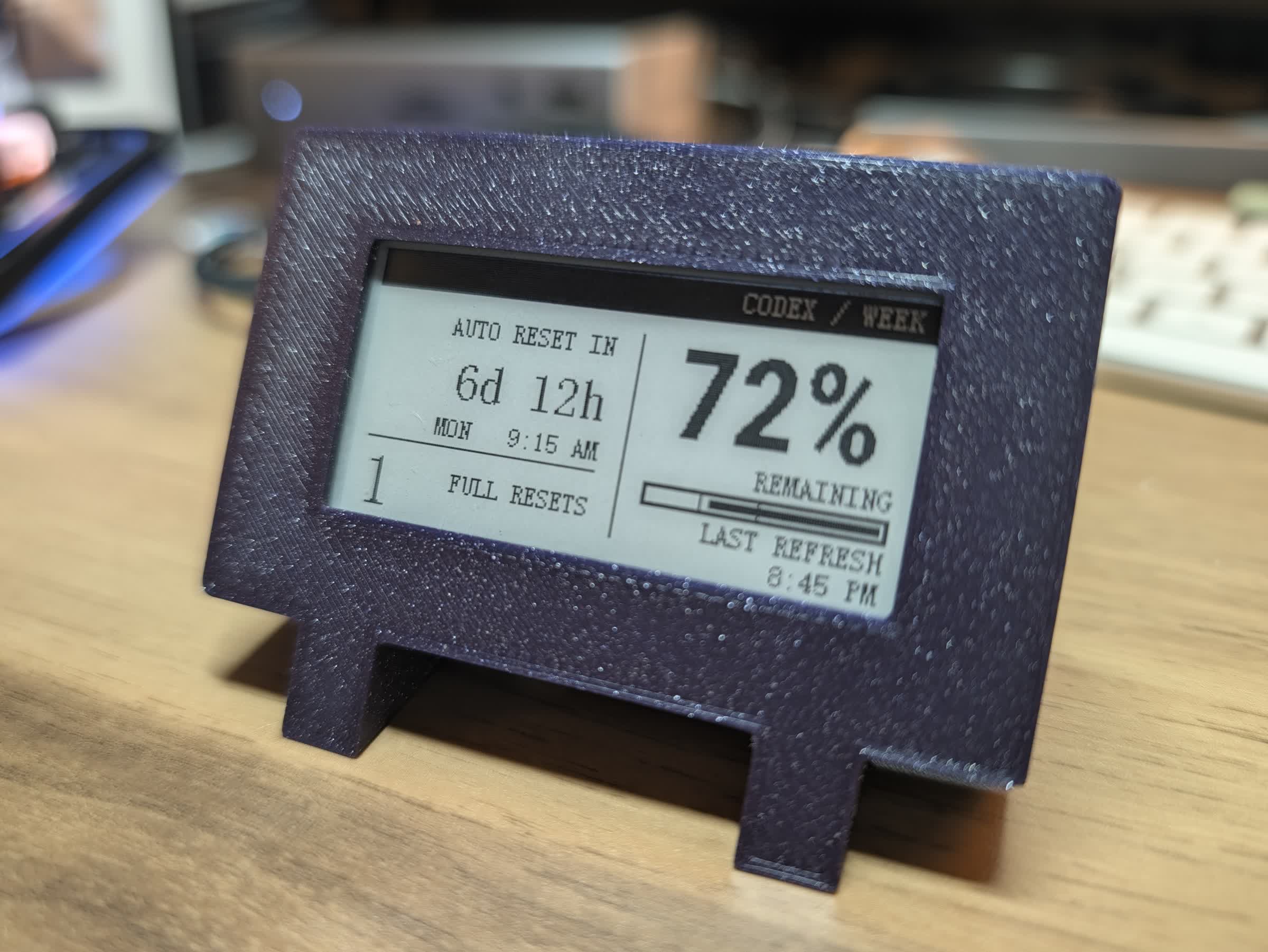 The finished purple e-paper Codex usage display, showing the remaining weekly percentage, reset time, and last refresh