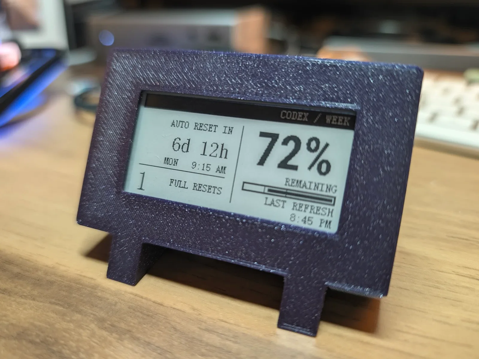 The finished purple e-paper Codex usage display, showing the remaining weekly percentage, reset time, and last refresh