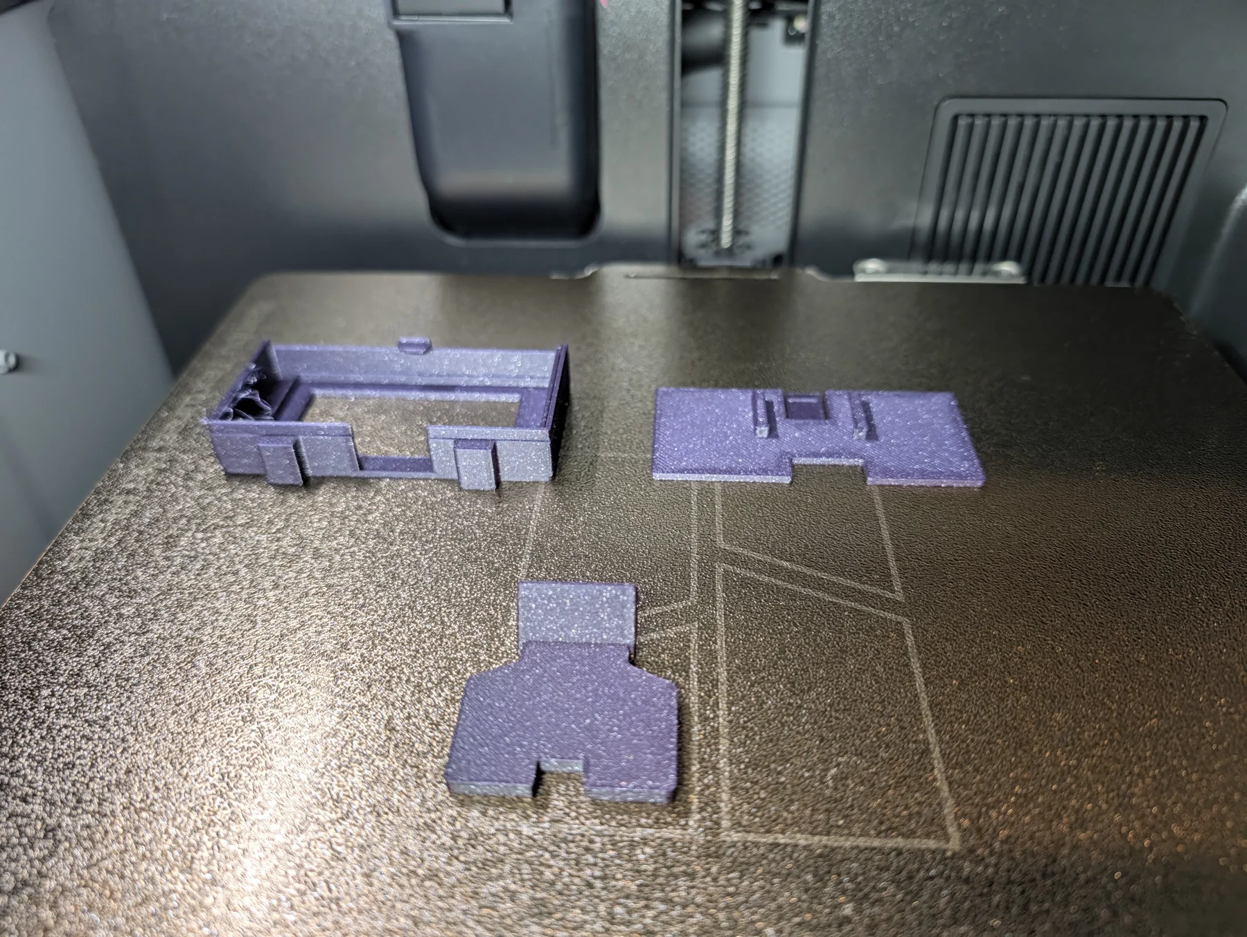 V2 enclosure pieces completed on the textured build plate
