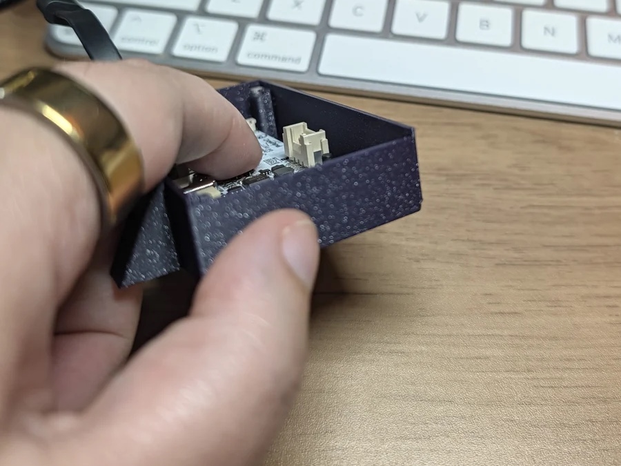 Hand-held V3 enclosure demonstrating excess space behind the screen